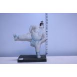 A novelty contemporary sumo figurine