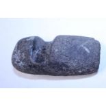 A stone axe head artifact (possibly North American)