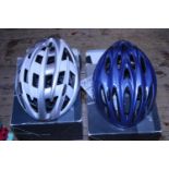 Two new boxed cycling safety helmets