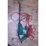 A qualcast electric hedge trimmer (unchecked)