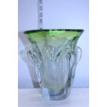 A large heavy green glass art vase