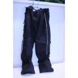 A pair of motorbike trousers