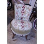 An upholstered boudoir chair. No postage