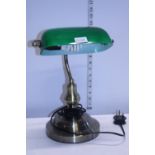 A bankers style desk lamp