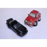 A Franklin Mint Porche 911 and a car moneybox