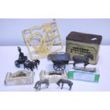 A selection of collectibles including a brass horse and carriage