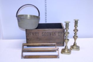 A vintage wooden advertising crate & contents of assorted brass ware items
