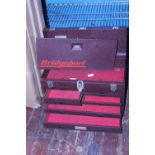 A vintage Bridgeport metal storage chest in good condition (no key). No postage
