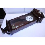 A large wall mounted Viennese style clock. No postage