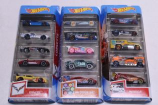 Three boxes of diecast Hot Wheels