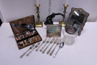 A good selection of collectibles including a silver-plate mirror and pair of brass candlesticks