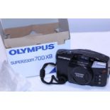 A boxed Olympus superzoom 700XB camera