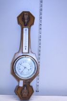 A wooden case barometer. No postage