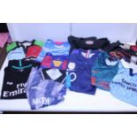 A mixture of football/rugby shirts. Some new with tags, assorted sizes
