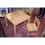 A kidkraft table and two chairs. No postage