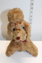 A 1960's musical stuffed toy dog.