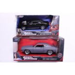 Two Fast and Furious die-cast models
