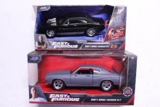 Two Fast and Furious die-cast models