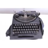 A Monarch Pioneer typewriter. No postage