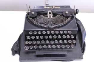 A Monarch Pioneer typewriter. No postage