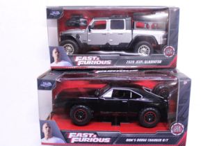 Two boxed fast and Furious diecast cars