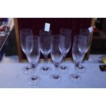 A set of seven Inn Crystal champagne flutes