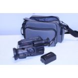 A Cannon camcorder with bag and accessories