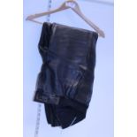 A pair of leather motorbike trousers
