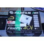 A boxed Fuji film compact digital camera