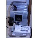 A DeLonghi bean to cup espresso and cappuccino machine with instructions etc (untested), shipping