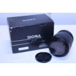 A boxed Sigma MS zoom lens