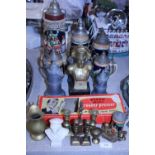A selection of mixed collectables including german beer steins and brassware