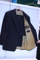A men's Hugo James suit