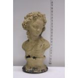 A heavy stone garden bust of a young woman. Shipping unavailable