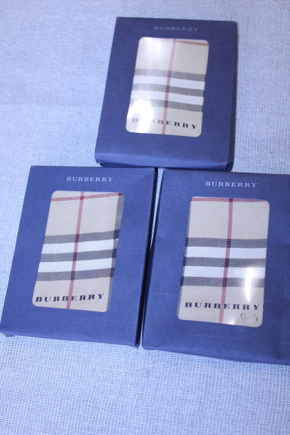 Three new boxed Burberry silk scarves 46cm x 46cm