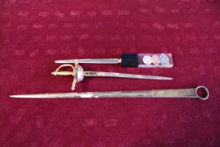 Two paper knives including Toledo and a vintage silver plated meat skewer