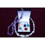 A selection of costume jewellery with semi- precious stones including crystals