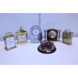 Five assorted time pieces and a Country Artists figurine