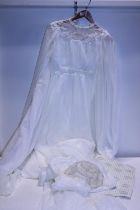 A wedding dress with head piece