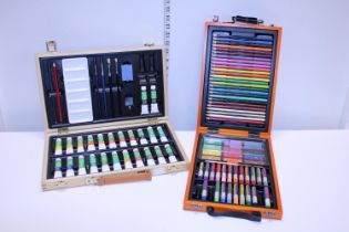 Two sets of artists crayons and oils etc