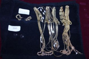 A good selection of gold tone necklaces and other