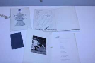 A 1973 Football Cup Final dinner menu signed by the Leeds United players and a 1970 Cup Final dinner