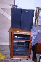 A vintage GPlan music cabinet and a Sony Hi-fi system, shipping unavailable