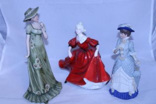 Three assorted figurines including Wedgewood and Coalport