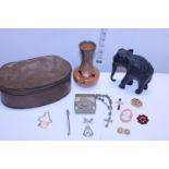 A selection of collectables including brooches etc