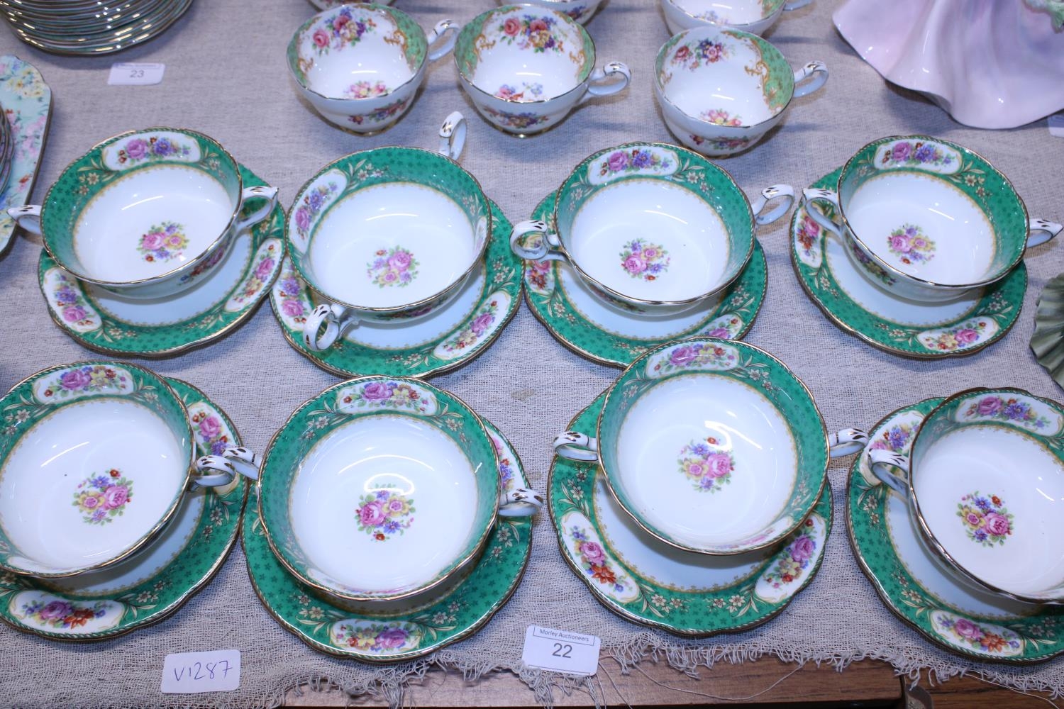 Eight Paragon bone china soup bowls and saucers