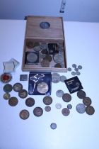 A job lot of assorted coinage including some silver and commemorative crowns etc