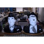 Two large ceramic signed Laurel and Hardy figures (damage to Hardy's hat and few chips on Stan's