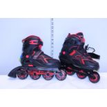 A new pair of children's in-line skates size 13C/3