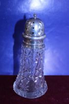 A hallmarked silver topped sugar sifter